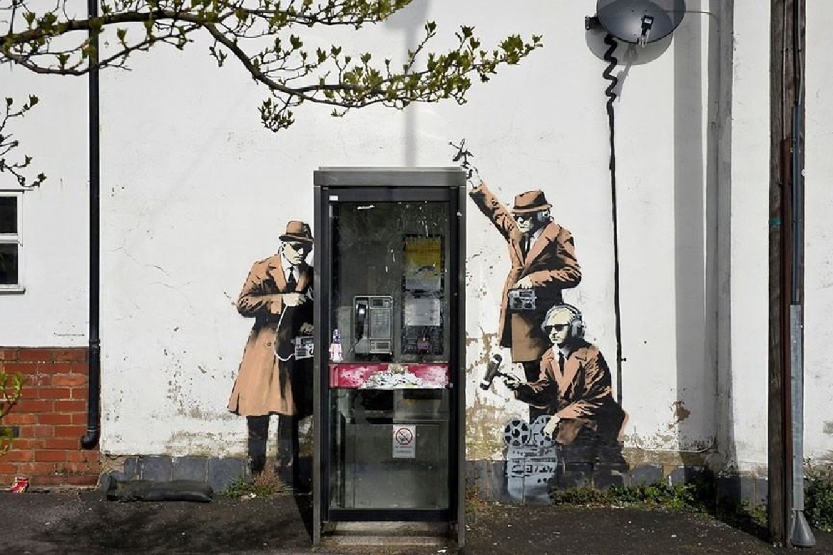 Banksy Artwork Spy Booth Valued at Million Pounds is Now Worth Nothing because it has been vandalized.