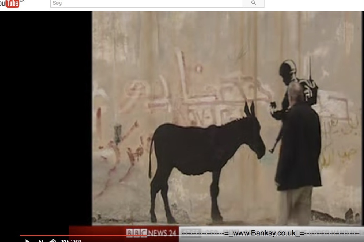 Rare footage from bethlehem where Banksy is interviewed on the works he did there in 2007.
